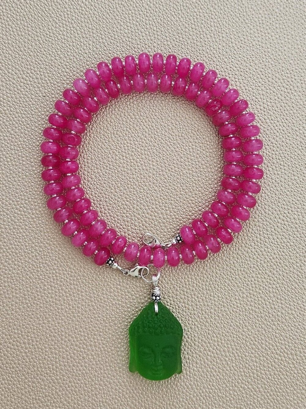 FUCHSIA COLORED JADE NECKLACE  W BUDDHA PENDANT.